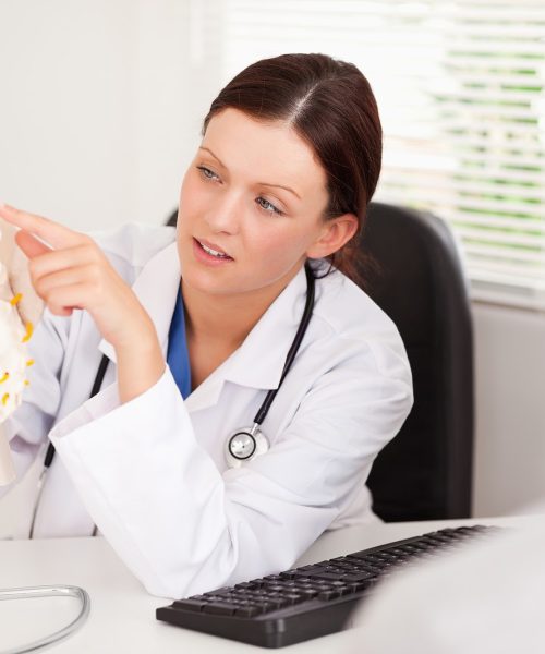 bigstock-A-female-doctor-is-pointing-on-22559741